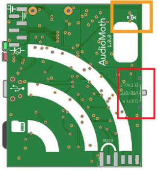 AudioMoth with orange box showing where the microphone is on the
device.